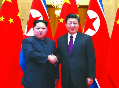 习近平同金正恩举行会谈