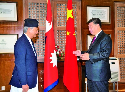 习近平会见尼泊尔大会党主席德乌帕