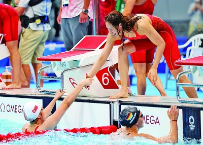 中国队在东京奥运会女子4×100米自由泳接力预赛中打破亚洲纪录