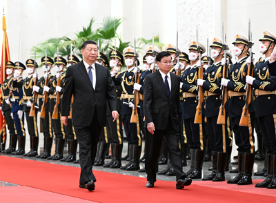 习近平同老挝人民革命党中央总书记国家主席通伦举行会谈