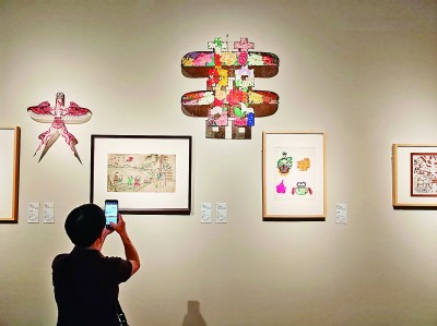在民间美术展领略“岁时华彩”