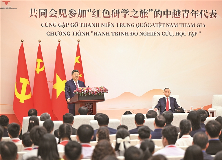 习近平同苏林共同会见中越青年代表 习近平同苏林共同会见中越青年代表